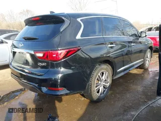 2019 Infiniti QX60 LUXE with VIN 5N1DL0MN4KC549132, listed as a IAAI auction lot 41786547 with 125,631 mi miles. Bid and sale history available at carsss.com. Image 4.