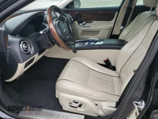 2013 Jaguar XJ with VIN SAJWA2GB7DLV40560, listed as a Copart auction lot 78228114 with 110,750 mi miles and Salvage Title. Bid and sale history available at carsss.com. Image 7.