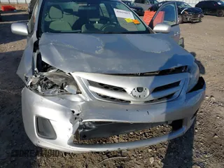 2012 Toyota Corolla L with VIN 2T1BU4EEXCC862368, listed as a IAAI auction lot 41829011 with 195,056 mi miles. Bid and sale history available at carsss.com. Image 6.