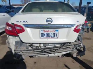 2016 Nissan Altima SV with VIN 1N4AL3APXGC193085, listed as a IAAI auction lot 41507049 with 105,058 mi miles and . Bid and sale history available at DreamBid. Image 12.