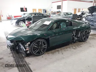 2021 Audi R8 z VIN WUAKBAFX3M7900923, wystawiony jako IAAI lot #41248773 z przebiegiem 7 048 mil mil oraz . Historia ofert i sprzedaży dostępna na DreamBid. Obrazek 2.