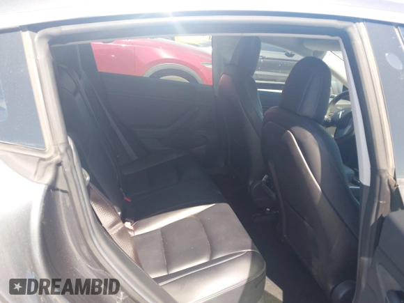 2018 Tesla Model 3 Long Range Battery z VIN 5YJ3E1EA9JF042319, wystawiony jako IAAI lot #41871931 z przebiegiem 138 837 mil mil oraz . Historia ofert i sprzedaży dostępna na DreamBid. Obrazek 8.