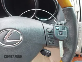 2007 Lexus RX 400h z VIN JTJGW31U572003651, wystawiony jako IAAI lot #42163515 z przebiegiem 358 648 mil mil oraz . Historia ofert i sprzedaży dostępna na DreamBid. Obrazek 11.