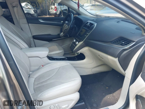 2019 Lincoln MKC Reserve with VIN 5LMCJ3D93KUL53163, listed as a IAAI auction lot 42097105 with 71,066 mi miles and . Bid and sale history available at DreamBid. Image 5.