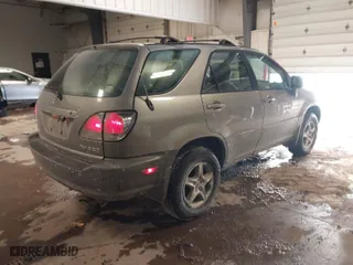 2002 Lexus RX 300 with VIN JTJHF10U720272717, listed as a IAAI auction lot 41604821 with 232,223 mi miles. Bid and sale history available at carsss.com. Image 4.