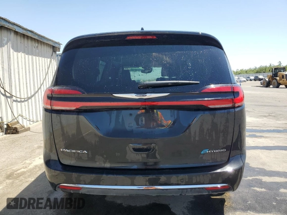 2023 Chrysler Pacifica Hybrid Touring L with VIN 2C4RC1L78PR632368, listed as a Copart auction lot 61763955 with 41,494 mi miles and Clean title. Bid and sale history available at DreamBid. Image 6.