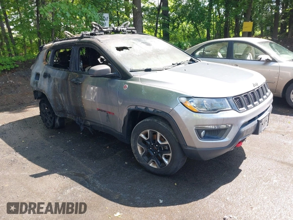2018 Jeep Compass Trailhawk with VIN 3C4NJDDB5JT130317, listed as a IAAI auction lot 42470070 with 95,000 mi miles and . Bid and sale history available at DreamBid. Image 1.