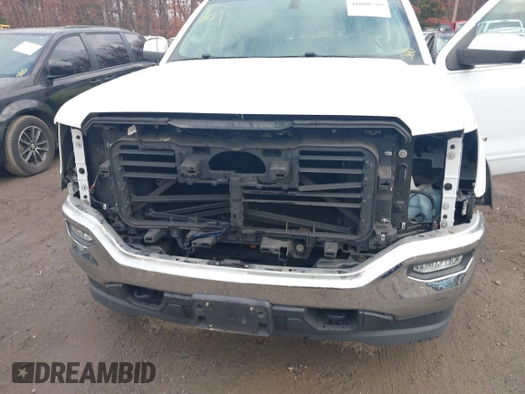 2017 GMC Sierra 1500 SLE z VIN 1GTV2MEC0HZ311932, wystawiony jako IAAI lot #40888769 z przebiegiem 72 676 mil mil oraz . Historia ofert i sprzedaży dostępna na DreamBid. Obrazek 6.
