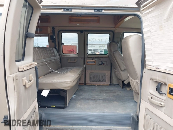 2003 Chevrolet Express Cargo YF7 Upfitter z VIN 1GBFG15T631192686, wystawiony jako IAAI lot #42097135 z przebiegiem 124 227 mil mil oraz . Historia ofert i sprzedaży dostępna na DreamBid. Obrazek 8.