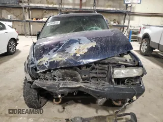 2001 Chevrolet Blazer LS z VIN 1GNCT18W01K143093, wystawiony jako Copart lot #82650514 z przebiegiem Nie podano mil oraz Szkoda całkowita • Salvage title. Historia ofert i sprzedaży dostępna na DreamBid. Obrazek 5.