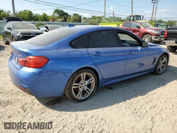 2015 BMW 4 Series 428i xDrive with VIN WBA4C9C5XFG135004, listed as a Copart auction lot 60551714 with 209,083 mi miles and Salvage Title. Bid and sale history available at DreamBid. Image 3.