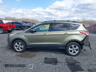 2013 Ford Escape SE с VIN 1FMCU9GXXDUC09846, выставлен на аукционе IAAI как лот 41925442 с пробегом 124 597 миль миль и . История ставок и продаж доступна на DreamBid. Изображение 14.