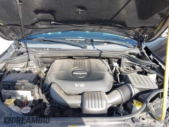 2014 Jeep Grand Cherokee Overland with VIN 1C4RJECG4EC523747, listed as a IAAI auction lot 40802143 with 124,079 mi miles. Bid and sale history available at carsss.com. Image 10.