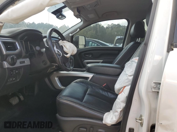2019 Nissan Titan Pro-4X z VIN 1N6AA1E51KN526104, wystawiony jako Copart lot #51694335 z przebiegiem 56 620 mil mil oraz Szkoda całkowita • Salvage title. Historia ofert i sprzedaży dostępna na DreamBid. Obrazek 7.