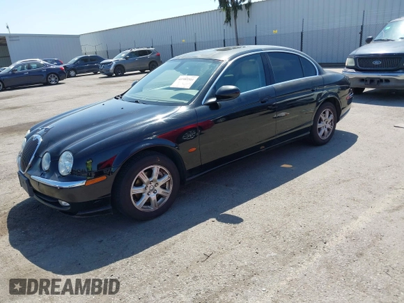 2003 Jaguar S-Type with VIN SAJEA01T13FM70486, listed as a IAAI auction lot 41989501 with 100,109 mi miles and . Bid and sale history available at DreamBid. Image 17.