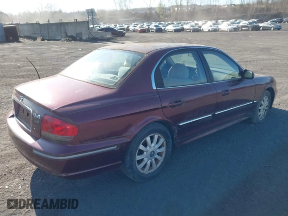 2002 Hyundai Sonata GLS with VIN KMHWF35H42A512538, listed as a IAAI auction lot 42000170 with 157,172 mi miles. Bid and sale history available at carsss.com. Image 4.