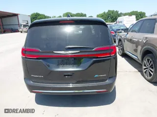 2023 Chrysler Pacifica Hybrid Touring L with VIN 2C4RC1L77PR540958, listed as a IAAI auction lot 42010484 with 61,166 mi miles. Bid and sale history available at carsss.com. Image 16.