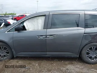 2012 Honda Odyssey EX-L with VIN 5FNRL5H64CB028040, listed as a IAAI auction lot 42126048 with 160,675 mi miles and . Bid and sale history available at DreamBid. Image 14.