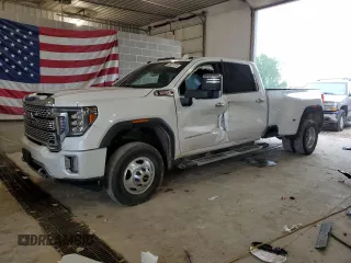 2020 GMC Sierra 3500HD Denali z VIN 1GT49WEY5LF265507, wystawiony jako Copart lot #53607974 z przebiegiem 62 955 mil mil oraz Szkody całkowita. Historia ofert i sprzedaży dostępna na DreamBid. Obrazek 1.