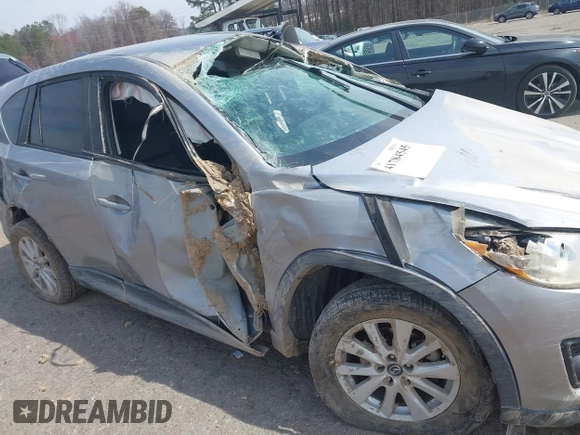 2015 Mazda CX-5 Touring with VIN JM3KE2CY6F0432910, listed as a IAAI auction lot 41784545 with 210,787 mi miles. Bid and sale history available at carsss.com. Image 17.
