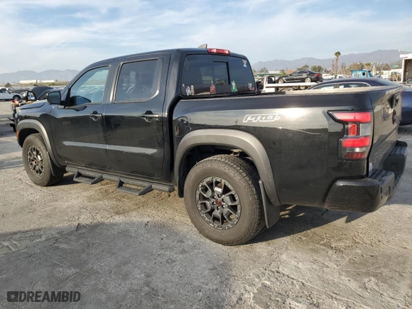 2023 Nissan Frontier PRO-4X with VIN 1N6ED1EK3PN667150, listed as a Copart auction lot 45538525 with 50,898 mi miles and Salvage Title. Bid and sale history available at carsss.com. Image 2.