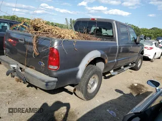 2003 Ford Super Duty F-250 XL with VIN 1FTNW21L33EC50476, listed as a Copart auction lot 67627394 with 277,849 mi miles and Salvage Title. Bid and sale history available at carsss.com. Image 3.