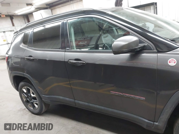 2018 Jeep Compass Trailhawk with VIN 3C4NJDDB5JT451600, listed as a IAAI auction lot 41893541 with 155,528 mi miles and . Bid and sale history available at DreamBid. Image 13.
