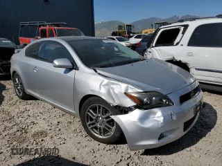 2009 Scion tC z VIN JTKDE167590296040, wystawiony jako Copart lot #58440895 z przebiegiem 171 825 mil mil oraz Szkoda całkowita • Salvage title. Historia ofert i sprzedaży dostępna na DreamBid. Obrazek 4.
