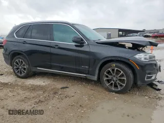 2014 BMW X5 xDrive35i z VIN 5UXKR0C59E0H23070, wystawiony jako Copart lot #55814815 z przebiegiem 113 895 mil mil oraz Szkody całkowita. Historia ofert i sprzedaży dostępna na DreamBid. Obrazek 4.