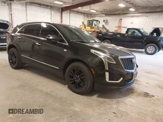 2021 Cadillac XT5 AWD Premium Luxury with VIN 1GYKNDR41MZ129884, listed as a IAAI auction lot 41835444 with 61,878 mi miles and . Bid and sale history available at DreamBid. Image 1.