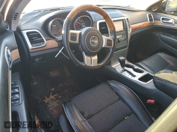 2011 Jeep Grand Cherokee Overland with VIN 1J4RS6GG0BC557302, listed as a Copart auction lot 83851734 with 195,443 mi miles and Salvage Title. Bid and sale history available at DreamBid. Image 8.