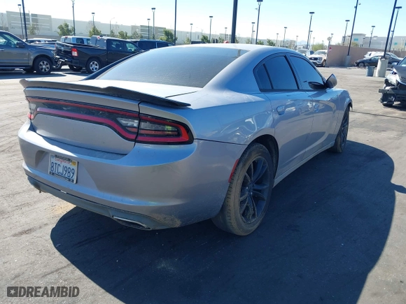 2017 Dodge Charger SE with VIN 2C3CDXBG6HH576448, listed as a IAAI auction lot 41666413 with 173,559 mi miles. Bid and sale history available at carsss.com. Image 4.