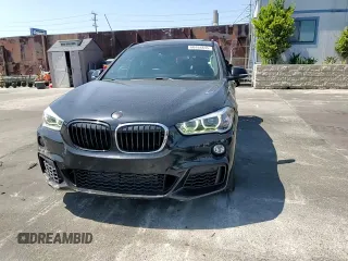 2018 BMW X1 xDrive28i z VIN WBXHT3C33J5L24441, wystawiony jako Copart lot #60468645 z przebiegiem 83 339 mil mil oraz Szkoda całkowita • Salvage title. Historia ofert i sprzedaży dostępna na DreamBid. Obrazek 13.