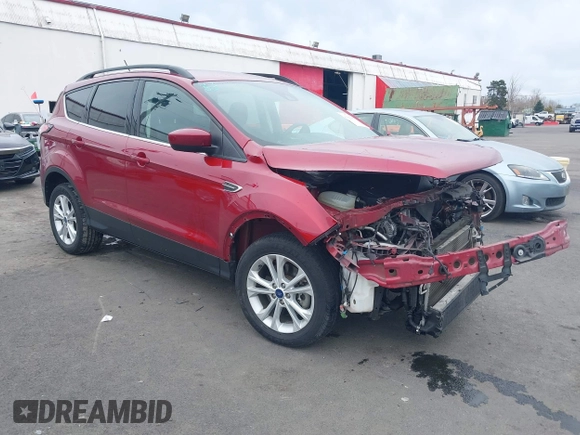 2018 Ford Escape SE z VIN 1FMCU9GD8JUB14803, wystawiony jako IAAI lot #41842056 z przebiegiem 50 712 mil mil oraz . Historia ofert i sprzedaży dostępna na DreamBid. Obrazek 1.