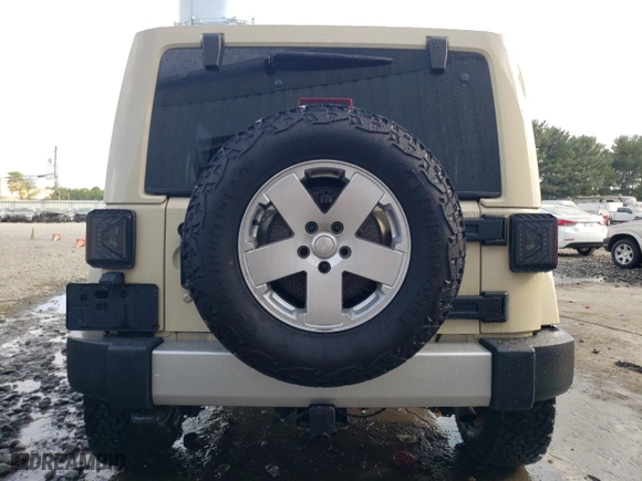 2011 Jeep Wrangler Unlimited Sahara with VIN 1J4BA5H19BL593658, listed as a Copart auction lot 71947684 with 122,323 mi miles and Salvage Title. Bid and sale history available at carsss.com. Image 6.