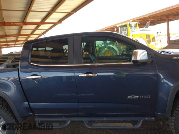 2018 Chevrolet Colorado 4WD Z71 z VIN 1GCGTDEN9J1231315, wystawiony jako IAAI lot #42440943 z przebiegiem 171 061 mil mil oraz . Historia ofert i sprzedaży dostępna na DreamBid. Obrazek 13.