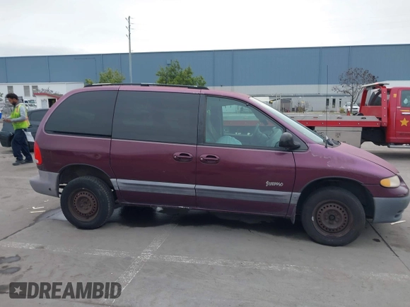 1999 Plymouth Voyager z VIN 2P4GP45R8XR382654, wystawiony jako IAAI lot #41576604 z przebiegiem 162 219 mil mil oraz . Historia ofert i sprzedaży dostępna na DreamBid. Obrazek 14.