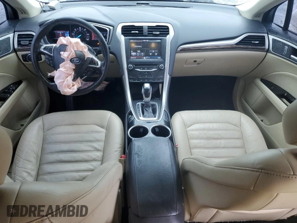 2013 Ford Fusion SE Hybrid with VIN 3FA6P0LU1DR358983, listed as a Copart auction lot 51907665 with 143,459 mi miles and Salvage Title. Bid and sale history available at DreamBid. Image 8.