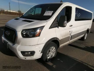 2024 Ford Transit Passenger Wagon XL with VIN 1FBAX2YG1RKA02357, listed as a IAAI auction lot 41798726 with 23,315 mi miles. Bid and sale history available at carsss.com. Image 2.