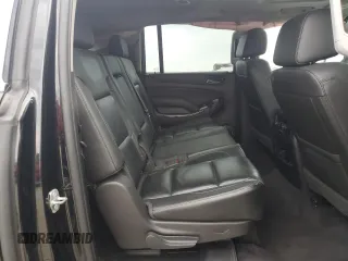 2019 Chevrolet Suburban LT with VIN 1GNSCHKC8KR127431, listed as a Copart auction lot 43931515 with 123,338 mi miles and Salvage Title. Bid and sale history available at DreamBid. Image 11.