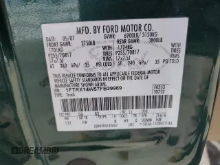 2007 Ford F-150 STX with VIN 1FTRX14W57FB39989, listed as a Copart auction lot 50695635 with 252,852 mi miles and Salvage title. Bid and sale history available at DreamBid. Image 12.