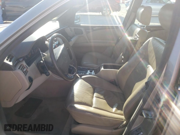 1996 Mercedes-Benz E-Class with VIN WDBJF55F7TJ022765, listed as a Copart auction lot 70577504 with 186,340 mi miles and Salvage Title. Bid and sale history available at carsss.com. Image 7.