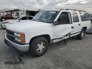 1996 Chevrolet Suburban with VIN 3GNEC16R5TG149147, listed as a Copart auction lot 84827204 with 320,305 mi miles and Salvage title. Bid and sale history available at DreamBid. Image 1.