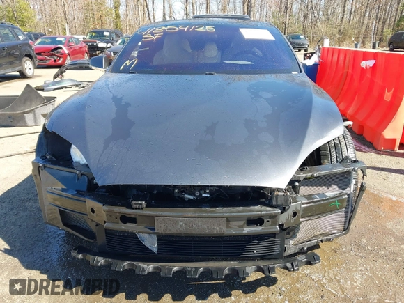 2017 Tesla Model S 100D with VIN 5YJSA1E22HF210635, listed as a IAAI auction lot 41854125 with 112,323 mi miles. Bid and sale history available at carsss.com. Image 13.