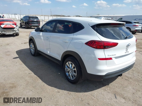 2019 Hyundai Tucson SE with VIN KM8J2CA43KU870933, listed as a IAAI auction lot 41972884 with 53,029 mi miles. Bid and sale history available at carsss.com. Image 3.