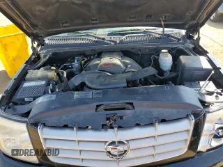 2006 Cadillac Escalade z VIN 1GYEK63N66R118790, wystawiony jako Copart lot #54369545 z przebiegiem 224 096 mil mil oraz Szkoda całkowita • Salvage title. Historia ofert i sprzedaży dostępna na DreamBid. Obrazek 12.