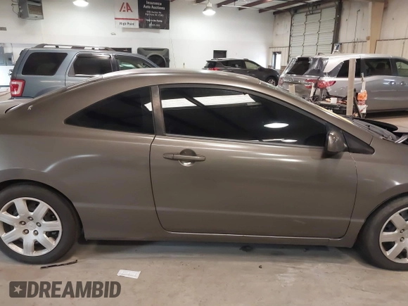 2008 Honda Civic Cpe LX with VIN 2HGFG12618H516020, listed as a IAAI auction lot 41374511 with 191,517 mi miles. Bid and sale history available at carsss.com. Image 13.