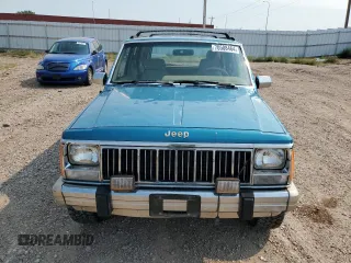 1993 Jeep Cherokee Country with VIN 1J4FJ78S8PL504126, listed as a Copart auction lot 70508464 with 153,163 mi miles and Clean Title. Bid and sale history available at carsss.com. Image 5.