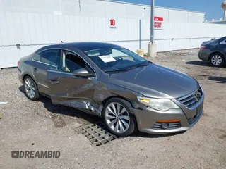 2009 Volkswagen CC Sport with VIN WVWEU73CX9E514415, listed as a IAAI auction lot 41597199 with 135,041 mi miles and . Bid and sale history available at DreamBid. Image 1.
