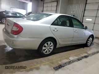2002 Toyota Camry LE z VIN 4T1BE32K32U063577, wystawiony jako Copart lot #58782185 z przebiegiem 243 589 mil mil oraz Szkoda całkowita • Salvage title. Historia ofert i sprzedaży dostępna na DreamBid. Obrazek 3.